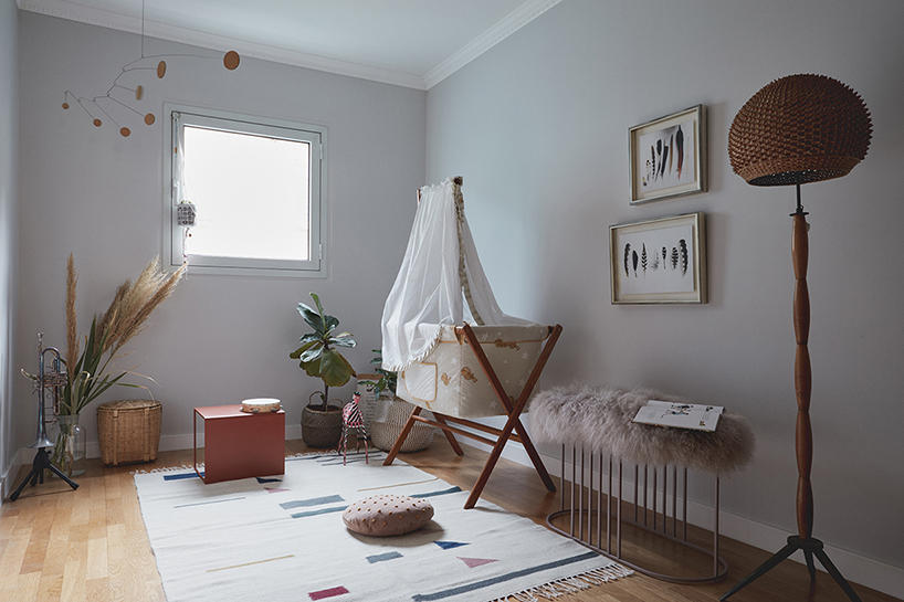 this apartment in tel aviv uses a wooden storage unit to separate private spaces thisisit designboom