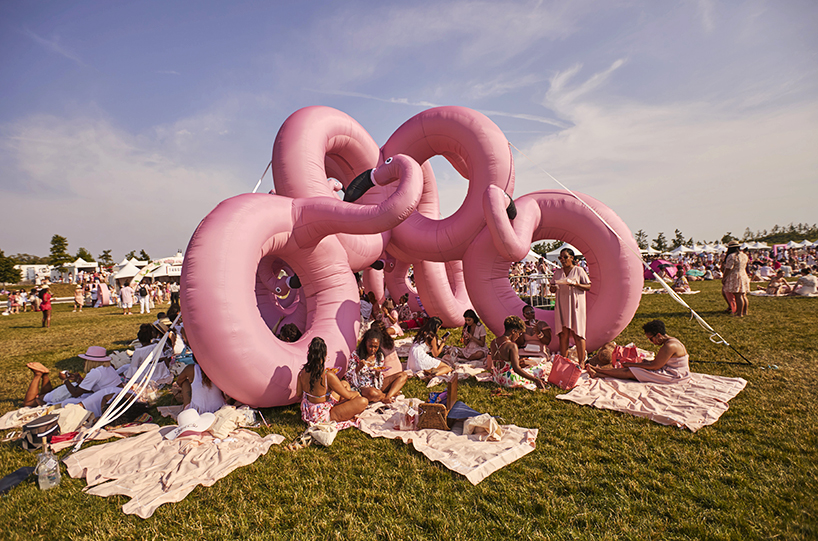 cyril lancelin uses pink flamingo inflatables in immersive installation for pinknic festival