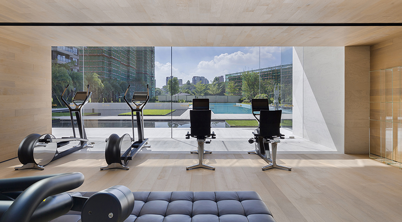 DOMANI's light-colored sky club house in china manifests a simple and vital atmosphere