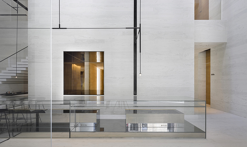 DOMANI's light-colored sky club house in china manifests a simple and vital atmosphere