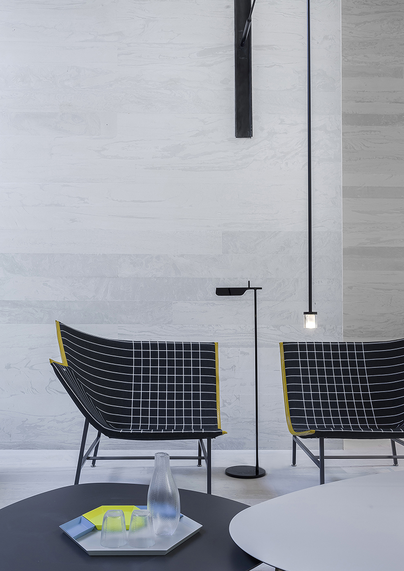 DOMANI's light-colored sky club house in china manifests a simple and vital atmosphere