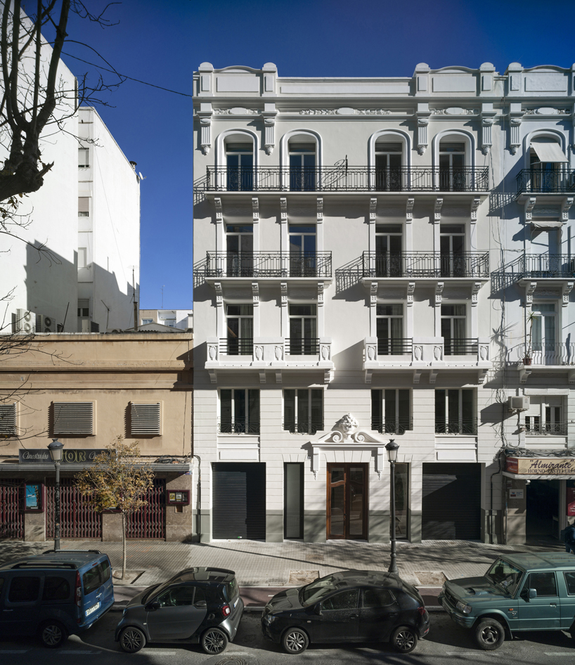 residential complex by ERRE arquitectura emerges as an urban oasis in the heart of valencia, spain