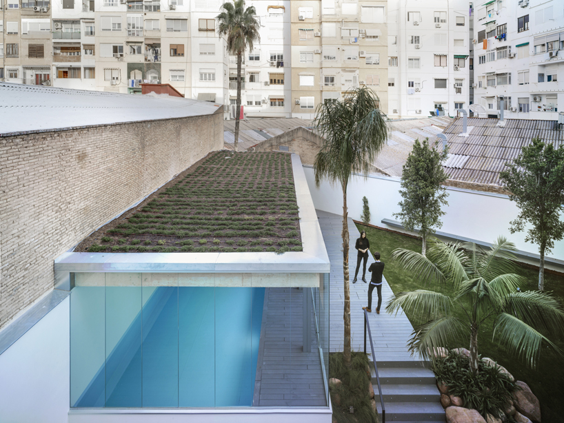 residential complex by ERRE arquitectura emerges as an urban oasis in the heart of valencia, spain