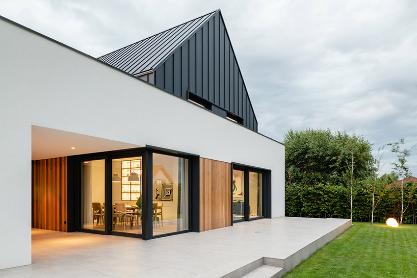 barn typology and modernism meet in residential project in poland