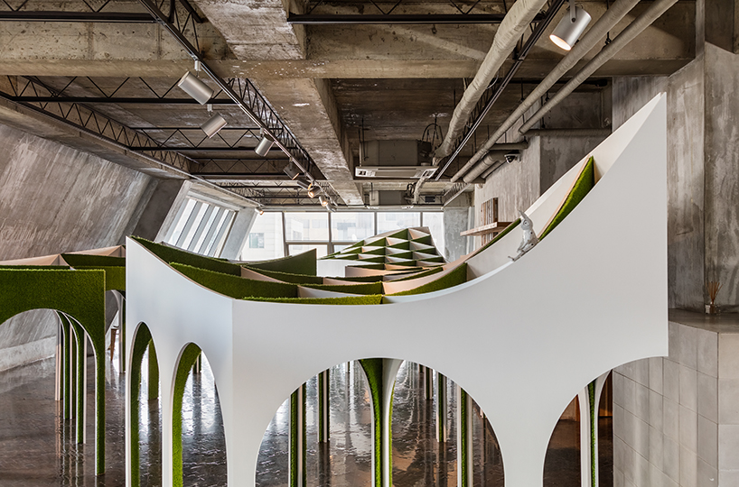 plain works + critical mass lab's arch forest installation is a surreal fairytale arcade designboom
