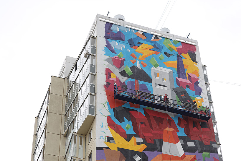 vitaly tsarenkov spray paints an 18-story mural in chelyabinsk, russia designboom