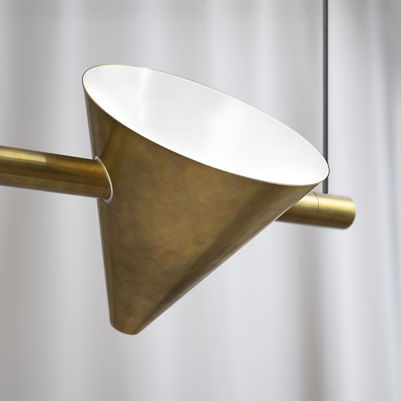 addi + örsjö introduce 'tell' modular cone-shaped brass luminaire