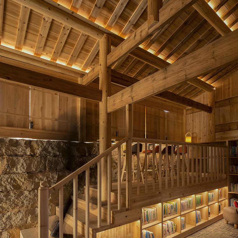 3andwich maintains rubble from chinese barn and transforms it into wooden bookstore