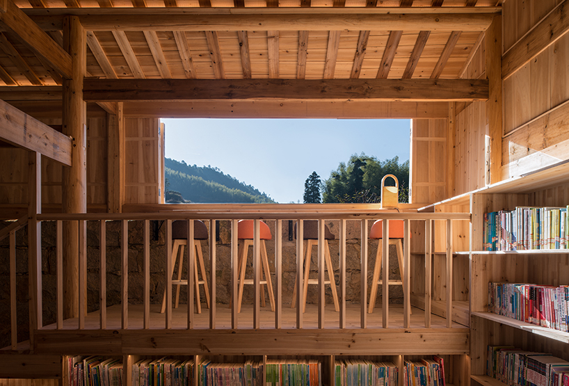3andwich maintains rubble from chinese barn and transforms it into wooden bookstore
