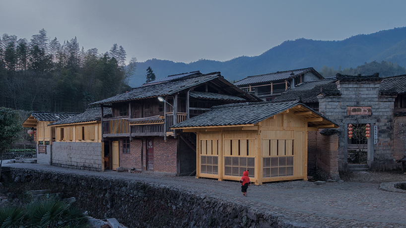 3andwich maintains rubble from chinese barn and transforms it into wooden bookstore