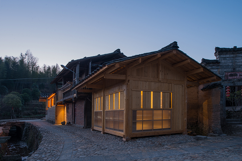 3andwich maintains rubble from chinese barn and transforms it into wooden bookstore