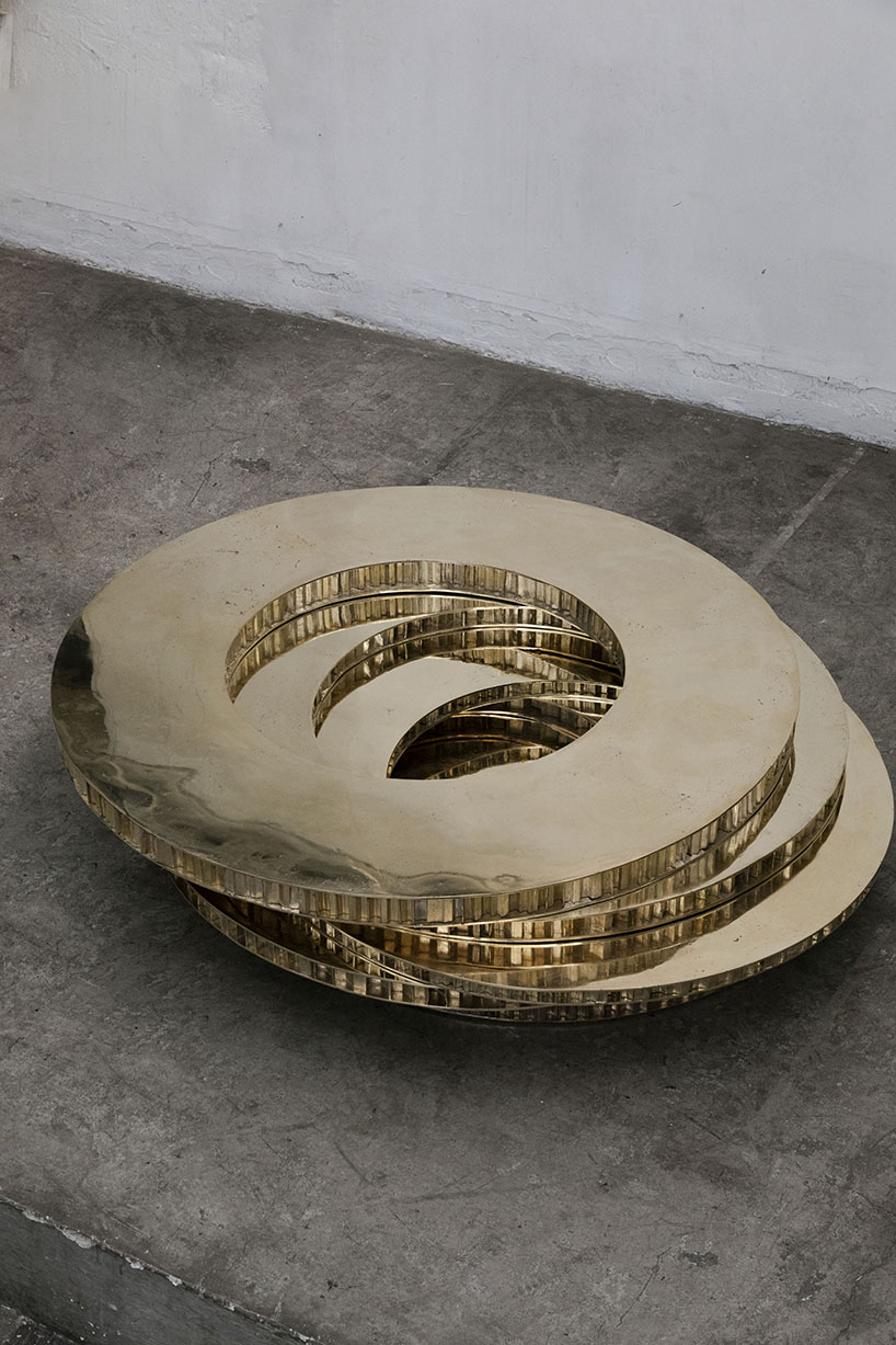héctor esrawe renders aleatory textures of cardboard as polished bronze coffee tables