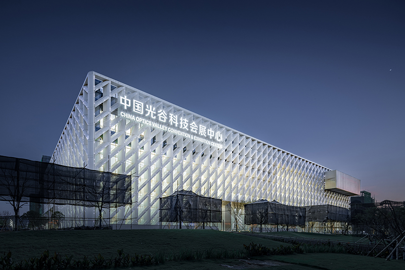 WSP architects' convention and exhibition center in china resembles an ivory carved statuette