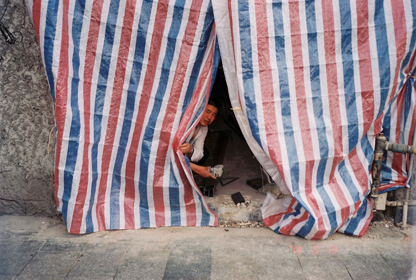 luke cardew recycles market stall material to create 100% waterproof raincoat