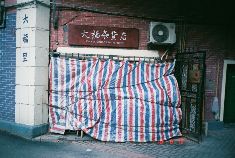 luke cardew recycles market stall material to create 100% waterproof raincoat
