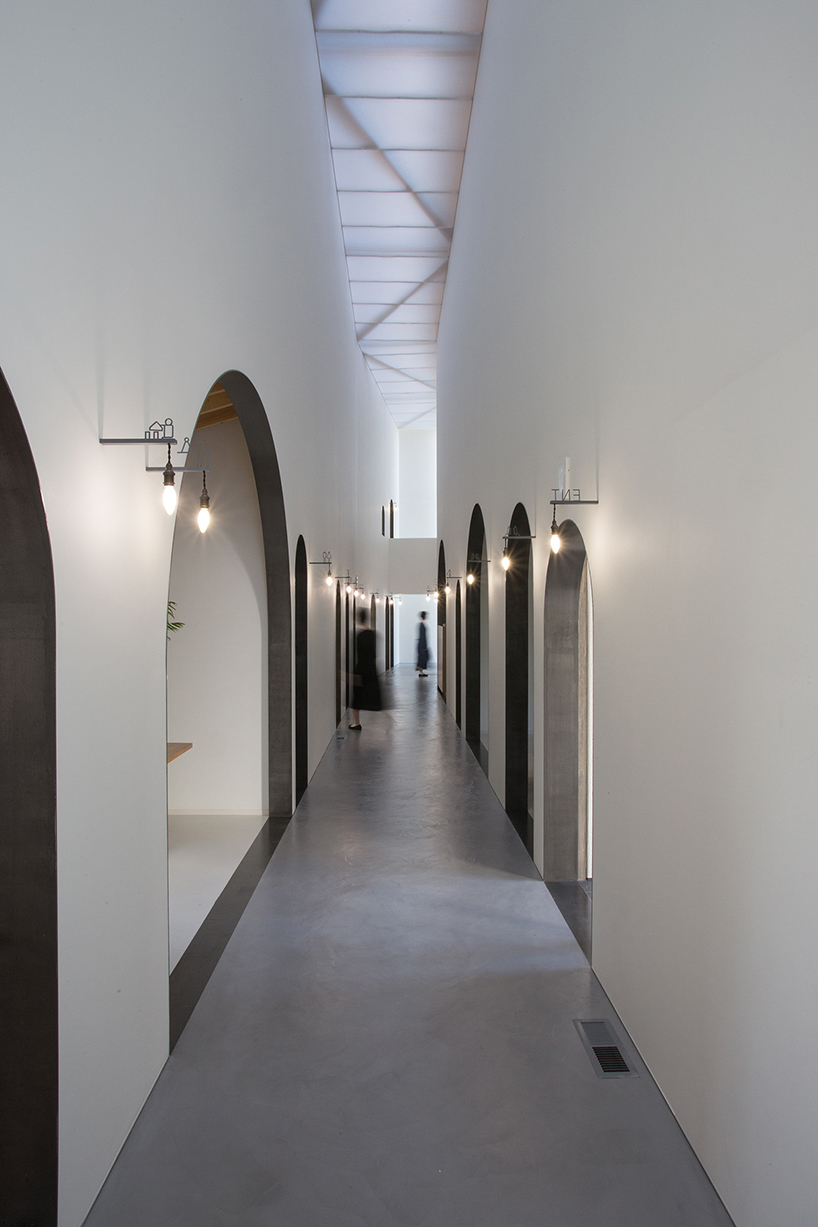 japanese dental clinic by 1-1 architects uses arches and natural light to play with patients' perception
