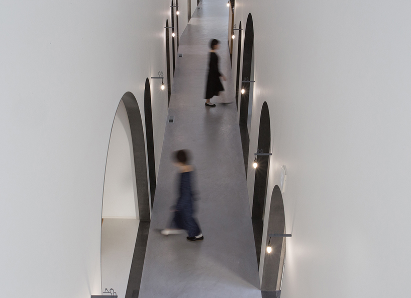 japanese dental clinic by 1-1 architects uses arches and natural light to play with patients' perception