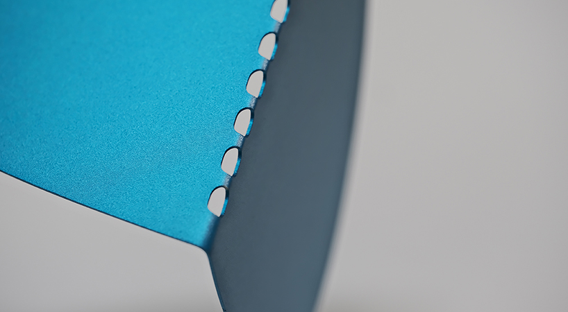 studio& nods to the japanese art of origami for the world’s thinnest bookend