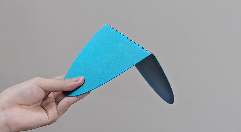 studio& nods to the japanese art of origami for the world’s thinnest bookend