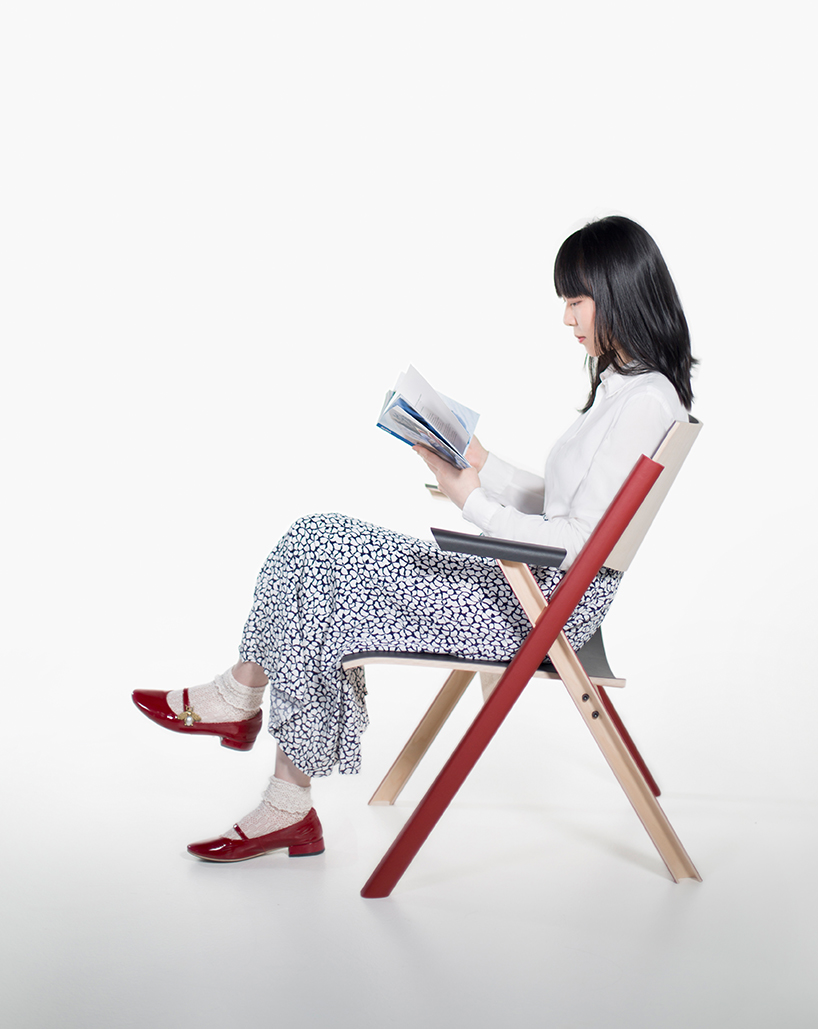 jinghua zeng uses laminated semi-tubes to construct the cross easy chair designboom