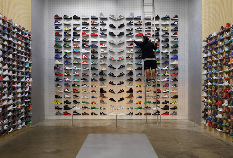 flight club in LA has product and a bench, by slade architecture