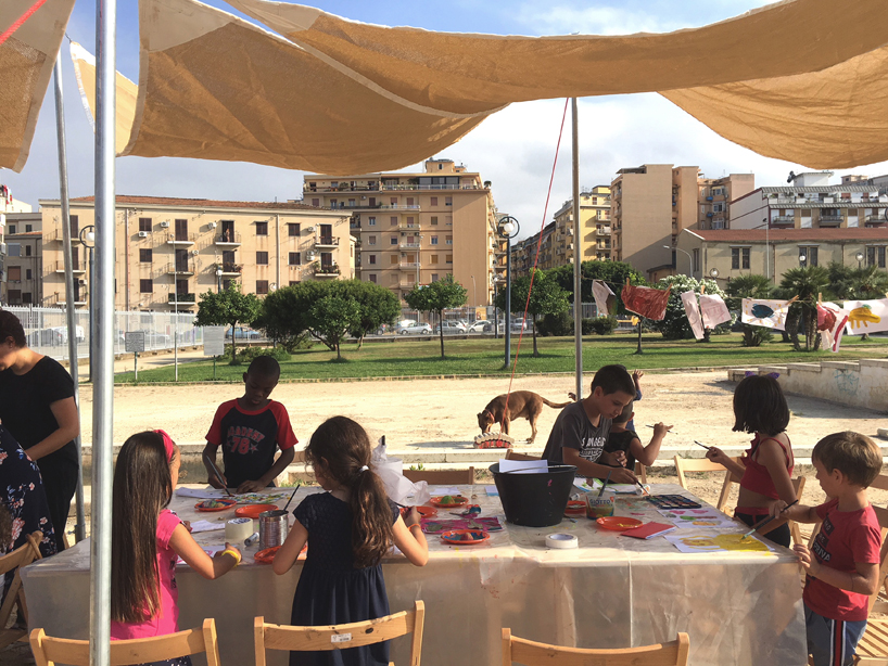 ENORME studio transforms a bus into education hub at manifesta 12 in palermo