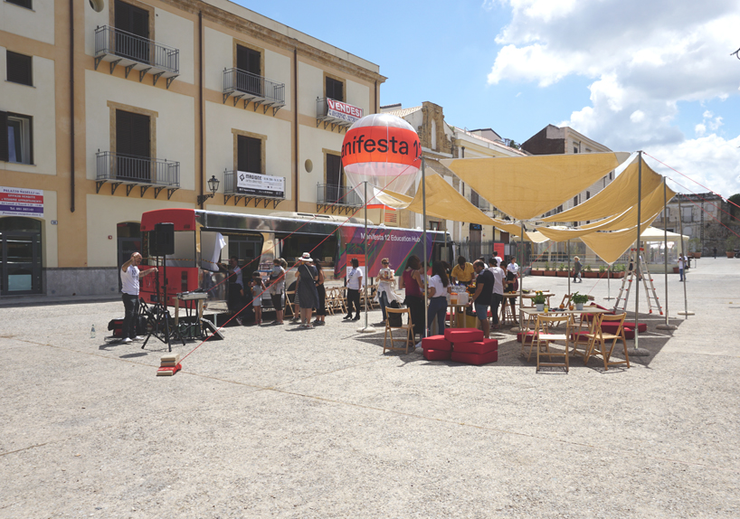 ENORME studio's education hub at manifesta in palermo is a regular bus