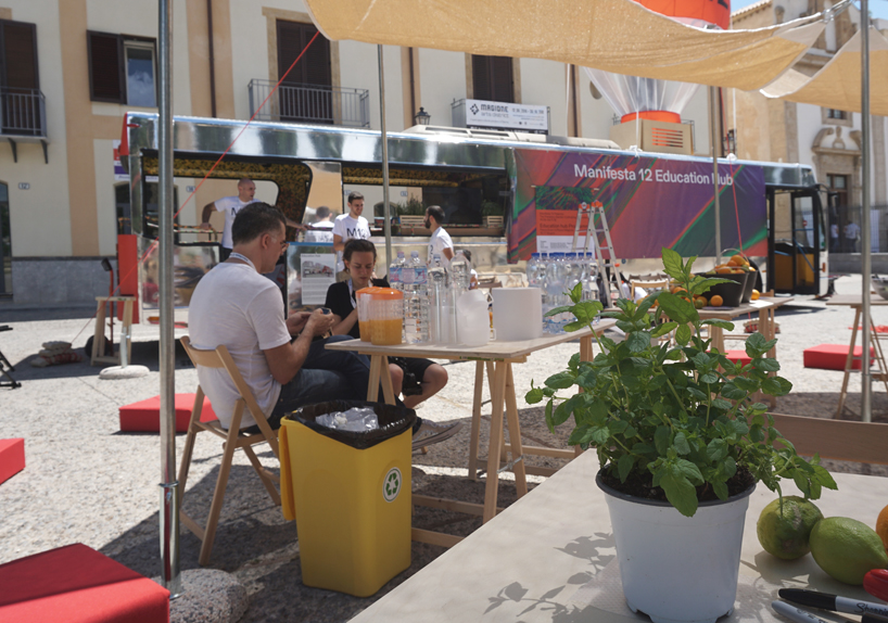 ENORME studio transforms a bus into education hub at manifesta 12 in palermo