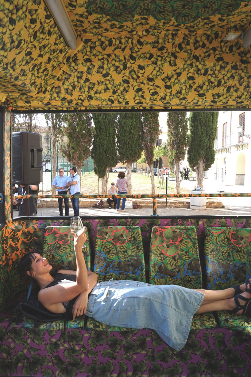 ENORME studio transforms a bus into education hub at manifesta 12 in palermo