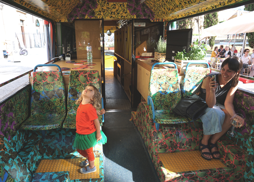 ENORME studio transforms a bus into education hub at manifesta 12 in palermo