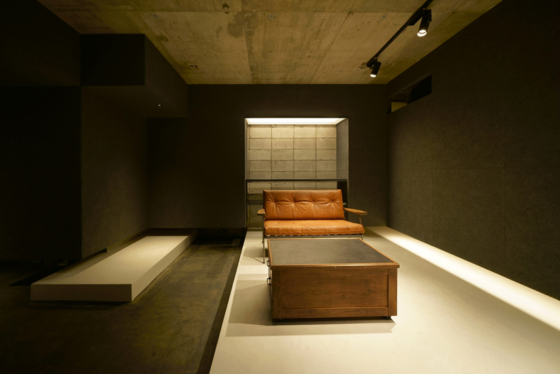 plus maizumi architect studio completes a shoe store with hanging walls in yokohama, japan