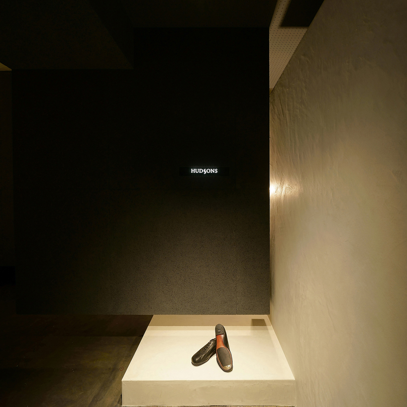 plus maizumi architect studio completes a shoe store with hanging walls in yokohama, japan