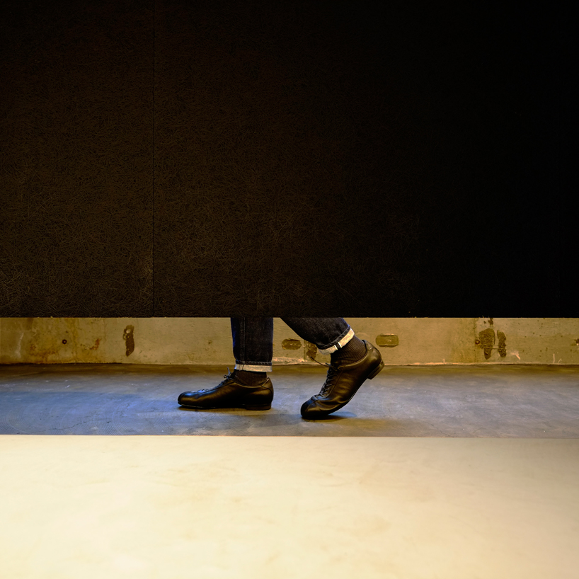 plus maizumi architect studio completes a shoe store with hanging walls in yokohama, japan