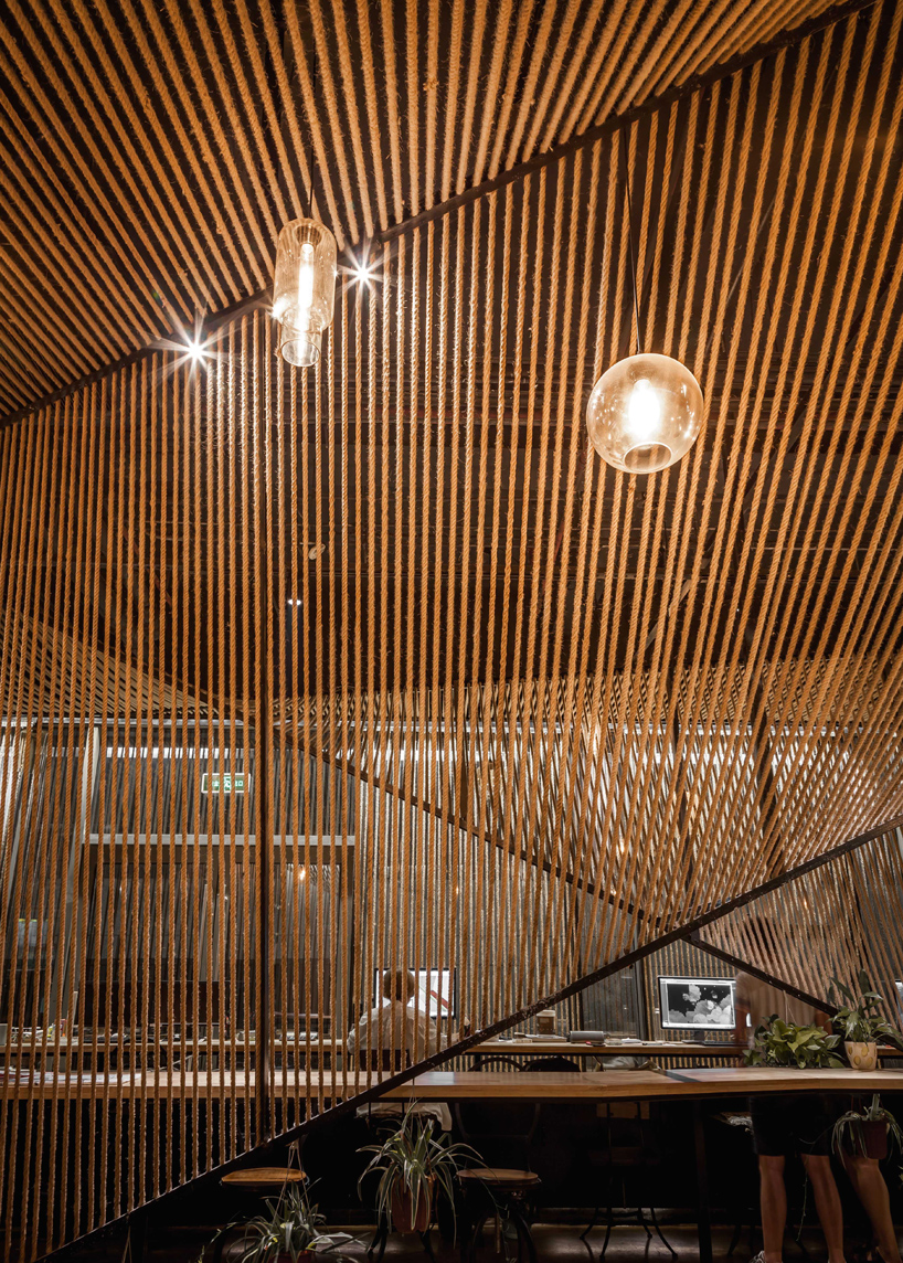 usual studio's chinese working space is decorated with naturally resourced materials