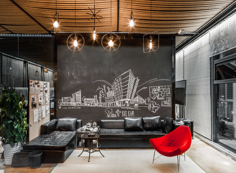 usual studio's chinese working space is decorated with naturally resourced materials