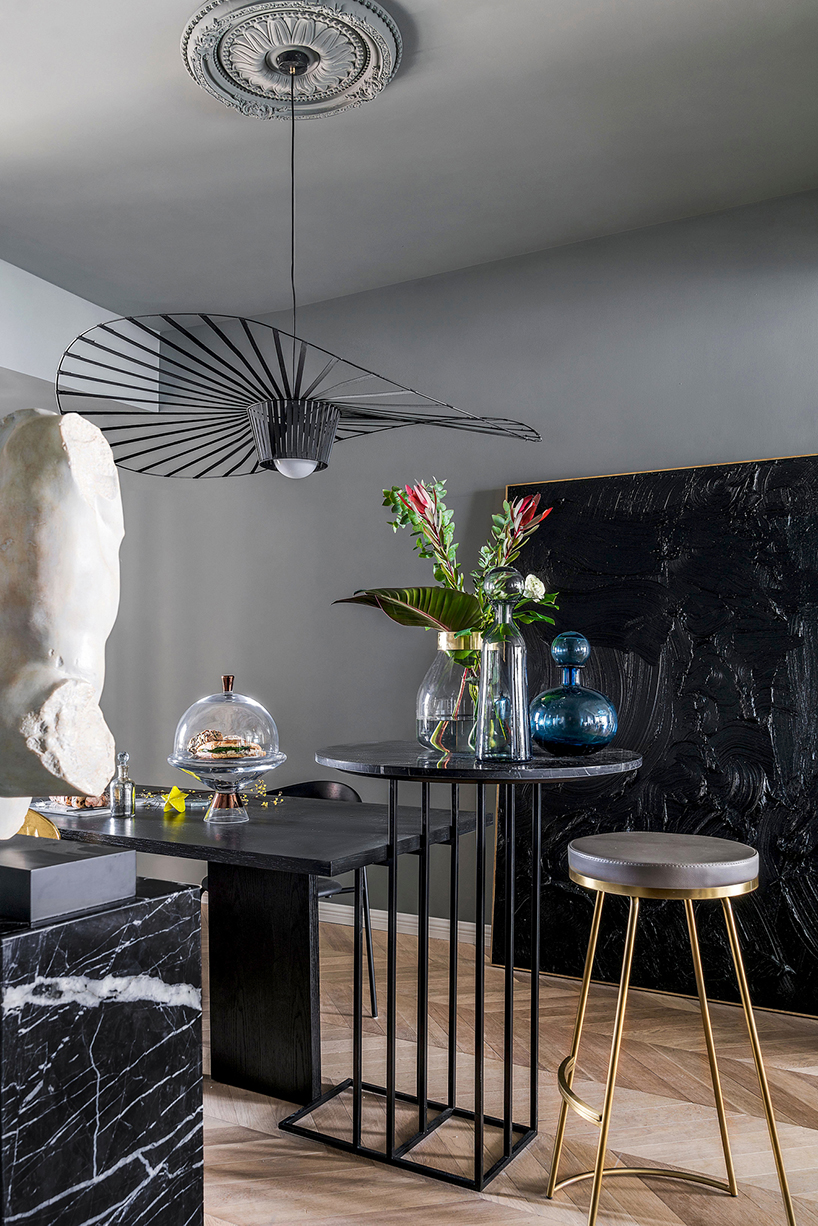 muxin studio designs shanghai apartment in unique and unconventional style