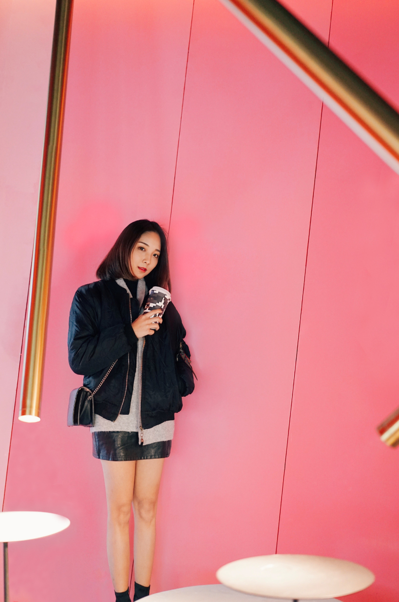 infinity nide's mole chha is a dome teahouse with red gradient walls and brass lighting tubes