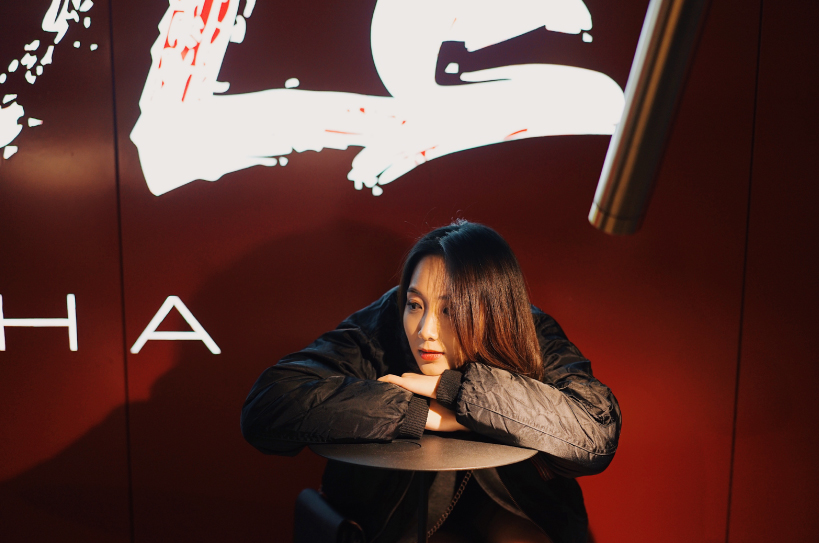 infinity nide's mole chha is a dome teahouse with red gradient walls and brass lighting tubes