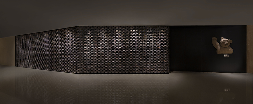 infinity nide brings the tradition of black chinese earthenware into restaurant interior