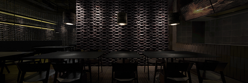 infinity nide brings the tradition of black chinese earthenware into restaurant interior