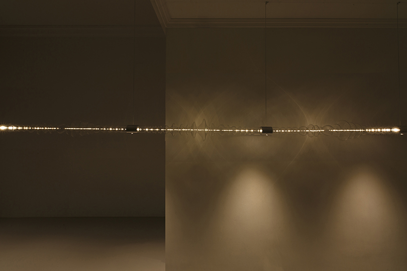 filamento, an over 1-meter long glass lighting sculpture designed by mayice designboom