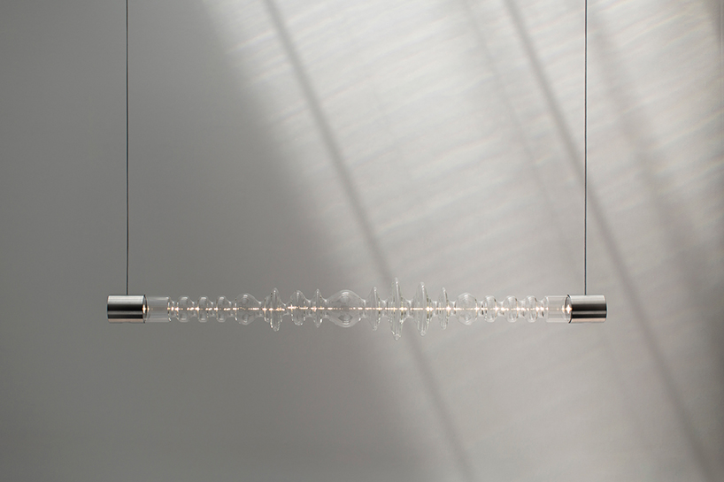 filamento, an over 1-meter long glass lighting sculpture designed by mayice designboom