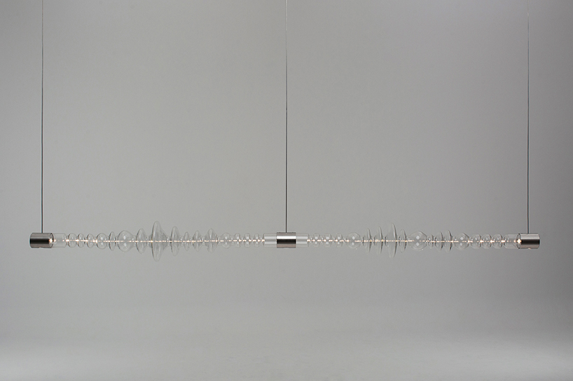 filamento, an over 1-meter long glass lighting sculpture designed by mayice designboom