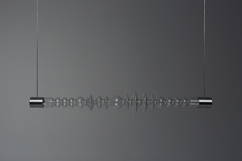filamento, an over 1-meter long glass lighting sculpture designed by mayice designboom