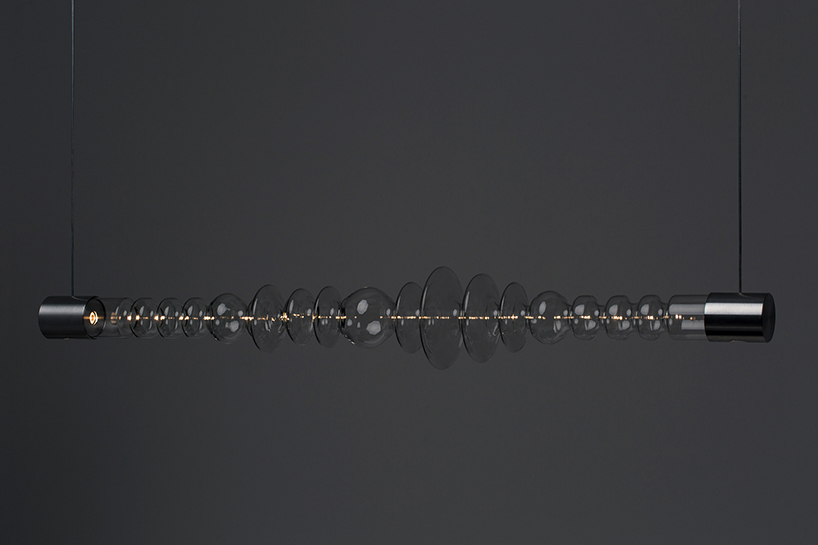 filamento, an over 1-meter long glass lighting sculpture designed by mayice designboom