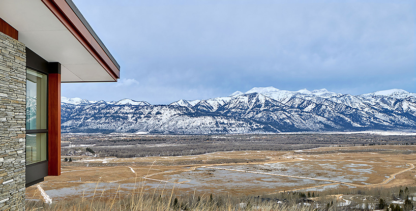 WELCH|HALL architects' cedar-covered home in wyoming overlooks the surrounding valleys