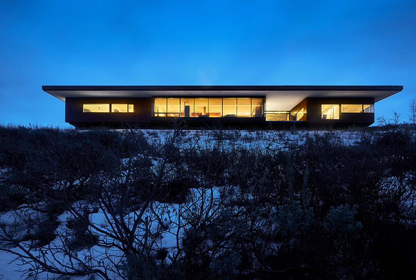 WELCH|HALL architects' cedar-covered home in wyoming overlooks the surrounding valleys