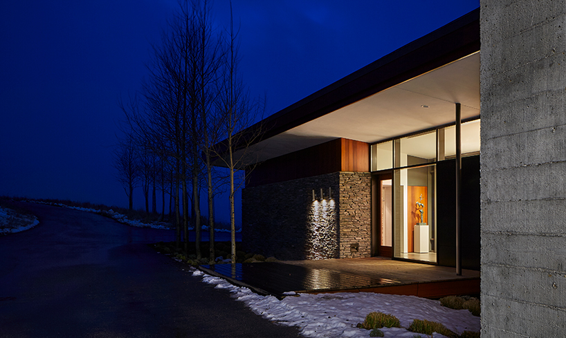 WELCH|HALL architects' cedar-covered home in wyoming overlooks the surrounding valleys
