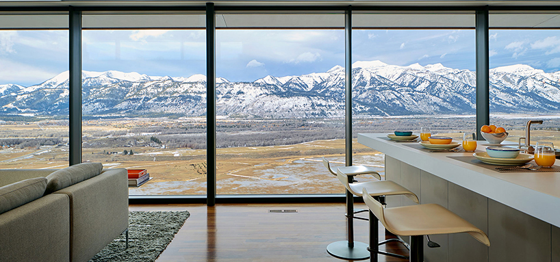 WELCH|HALL architects' cedar-covered home in wyoming overlooks the surrounding valleys