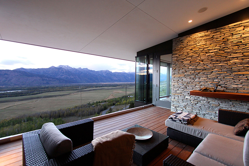 WELCH|HALL architects' cedar-covered home in wyoming overlooks the surrounding valleys